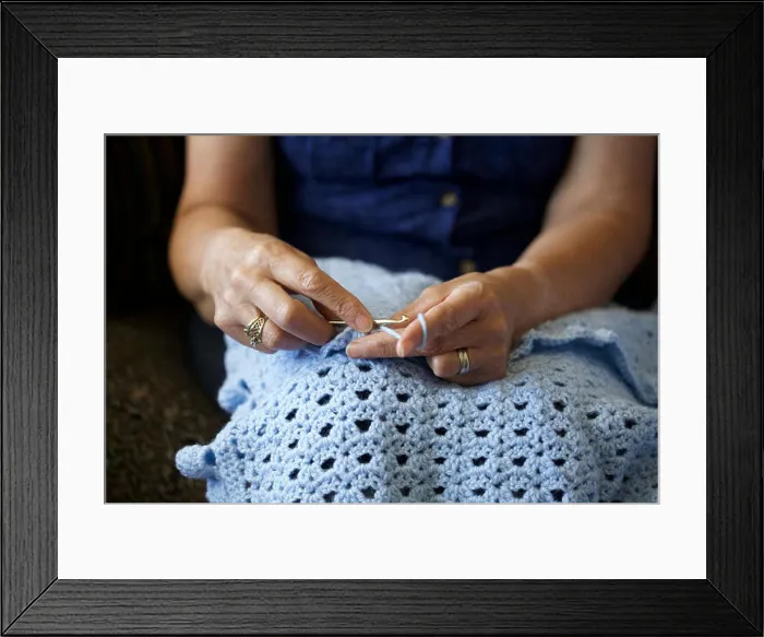 Framed Print : Close up picture of a Caucasian woman crocheting at home Framed Print : Close up picture of a Caucasian woman crocheting at home
