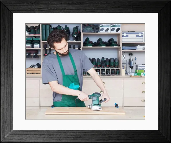 Framed Print : Work carpenter in the carpenter's workshop. A close-up of the tool. For woodworking Framed Print : Work carpenter in the carpenter's workshop. A close-up of the tool. For woodworking