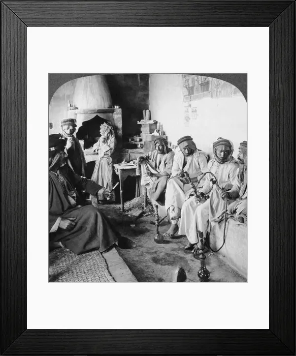 Framed Print : Mosul, Iraq: c. 1900 Arab men at their leisure in a coffee house in Mosul Framed Print : Mosul, Iraq: c. 1900 Arab men at their leisure in a coffee house in Mosul