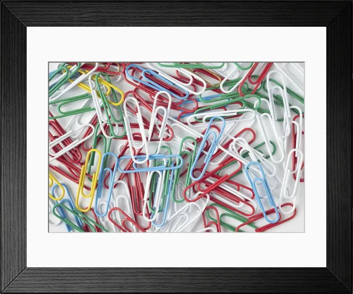 Framed Print : Multicolored paper clips on a white background, texture background Framed Print : Multicolored paper clips on a white background, texture background