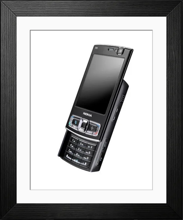 Framed Print : An old style push up Nokia mobile phone Framed Print : An old style push up Nokia mobile phone