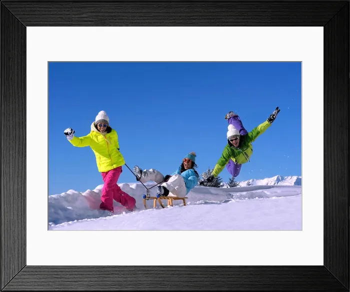 Framed Print : three happy teens playing in snow, France, Savoie, Val d Isere Framed Print : three happy teens playing in snow, France, Savoie, Val d Isere