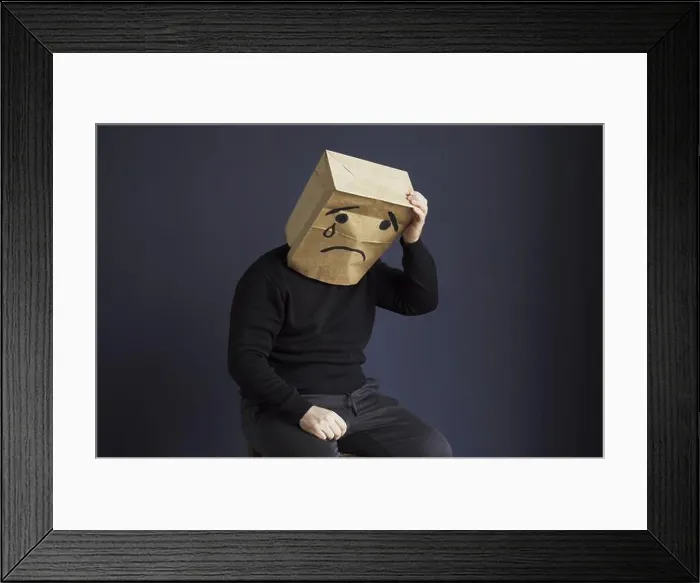 Framed Print : A sad man in a black turtleneck with a bag on his head Framed Print : A sad man in a black turtleneck with a bag on his head