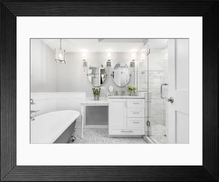 Framed Print : A beautiful white bathroom with a stand alone clawfoot bathtub with chrome hardware Framed Print : A beautiful white bathroom with a stand alone clawfoot bathtub with chrome hardware