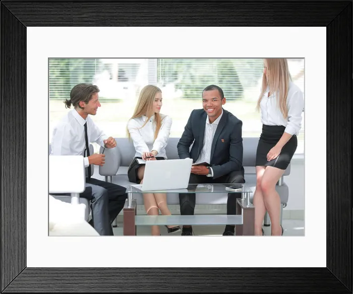 Framed Print : concentrated business team at the workplace thinking about business problems Framed Print : concentrated business team at the workplace thinking about business problems