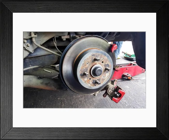 Framed Print : Disc brakes front of the car to use for the old and rusty