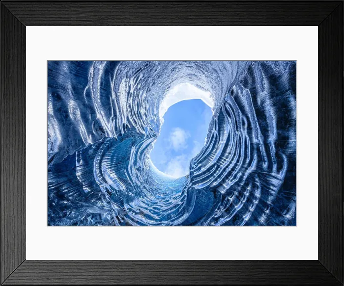 Framed Print : Looking up through a opening in a glacier cave in Iceland Framed Print : Looking up through a opening in a glacier cave in Iceland