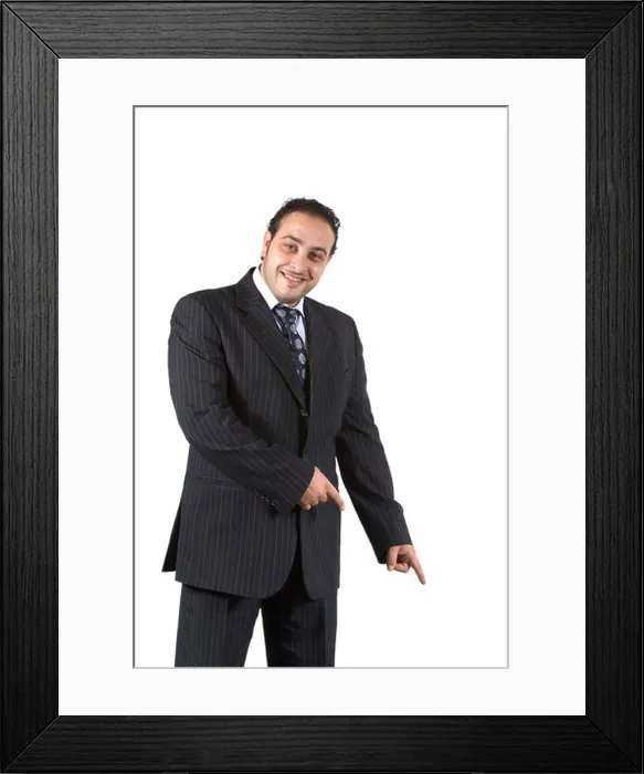 Framed Print : Business man pointing down with two hands smiling Framed Print : Business man pointing down with two hands smiling