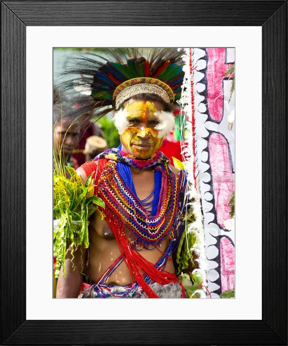 Framed Print : Woman with her face painted and wearing traditional tribal costume at the singsing Goroka Festival, Papua New Guinea Framed Print : Woman with her face painted and wearing traditional tribal costume at the singsing Goroka Festival, Papua New Guinea