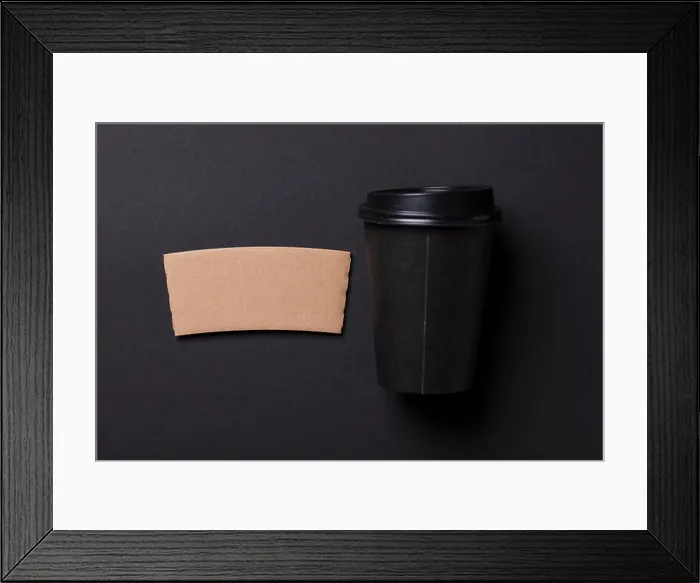 Framed Print : Black coffee cup with blank brown label Framed Print : Black coffee cup with blank brown label