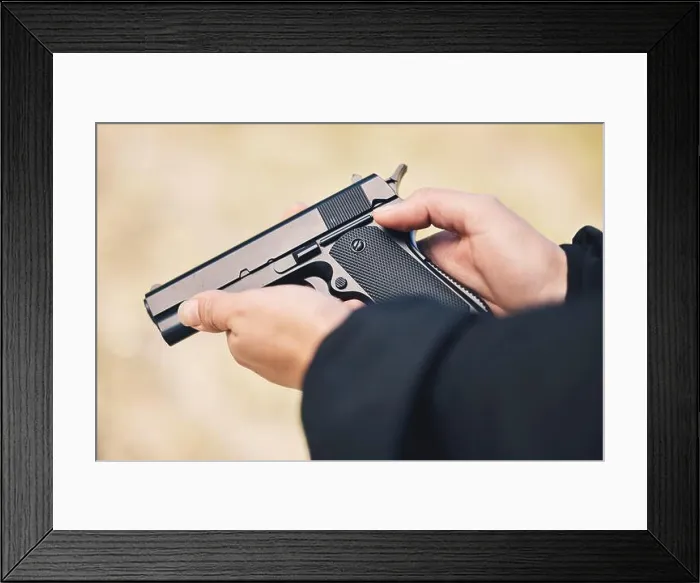 Framed Print : Weapon, pistol and hands with gun outdoor for police Framed Print : Weapon, pistol and hands with gun outdoor for police