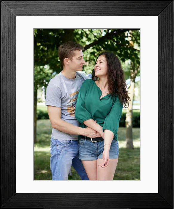 Framed Print : Romantic couple posing in city park, summer season, lovers boy and girl Framed Print : Romantic couple posing in city park, summer season, lovers boy and girl