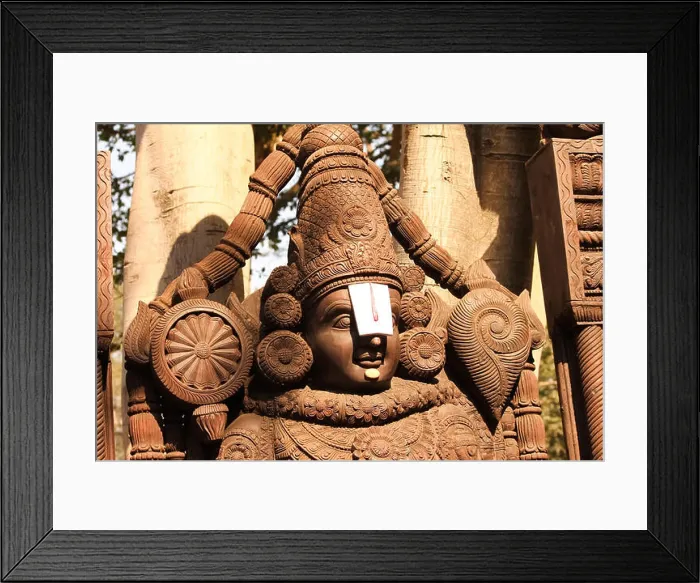 Framed Print : Sculpture of venkateshwar god created through woodern carving work Framed Print : Sculpture of venkateshwar god created through woodern carving work