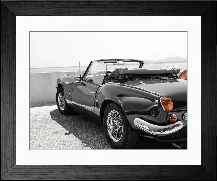 Framed Print : Black and White with partial red colour image of a Triumph Spitfire...A classic English convertible sports car Framed Print : Black and White with partial red colour image of a Triumph Spitfire...A classic English convertible sports car