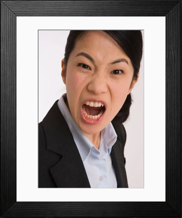 Framed Print : Portrait of a businesswoman shouting in anger Framed Print : Portrait of a businesswoman shouting in anger