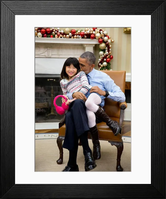 Framed Print : Dec. 4, 2015 'The President snuggles with his niece Savita Ng after his sister Framed Print : Dec. 4, 2015 'The President snuggles with his niece Savita Ng after his sister