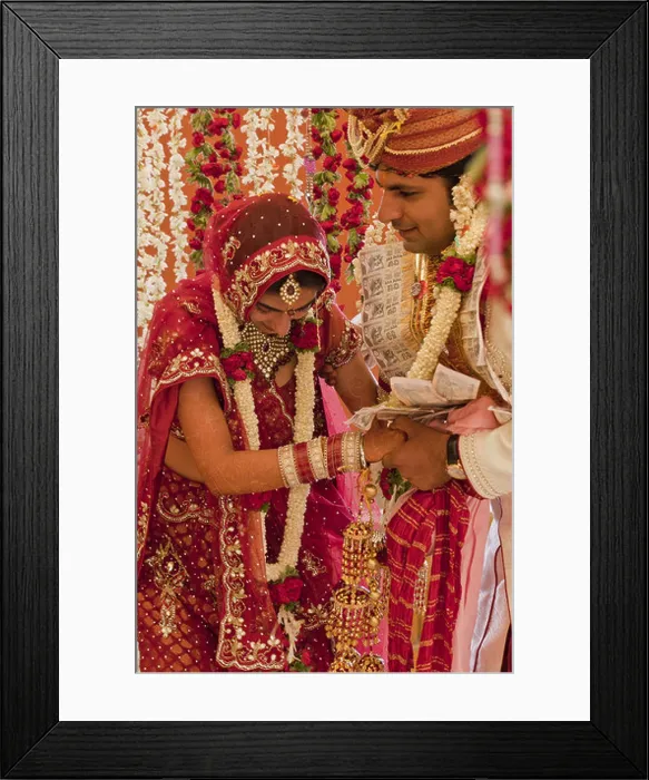 Framed Print : Newly wed Indian couple at their Wedding ceremony Framed Print : Newly wed Indian couple at their Wedding ceremony