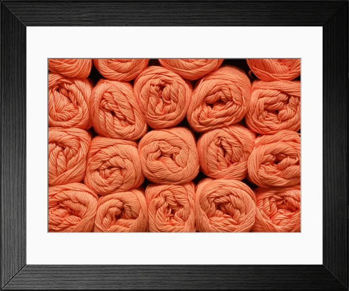 Framed Print : Wool rolls in a shelf as a background Framed Print : Wool rolls in a shelf as a background