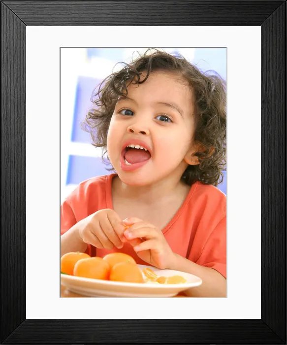 Framed Print : CHILD EATING FRUIT Framed Print : CHILD EATING FRUIT