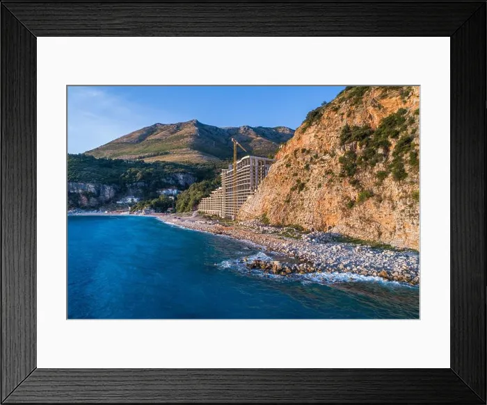 Framed Print : Aerial view of the unfinished hotel in the village of Rezevici, on the coast of Montenegro Framed Print : Aerial view of the unfinished hotel in the village of Rezevici, on the coast of Montenegro