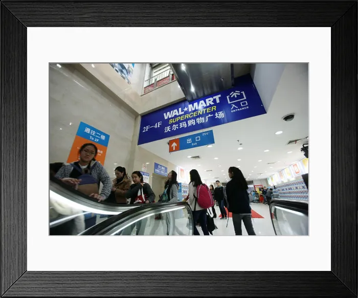 Framed Print : FILE--Chinese customers go shopping at a Wal-Mart Supercenter in Shanghai Framed Print : FILE--Chinese customers go shopping at a Wal-Mart Supercenter in Shanghai