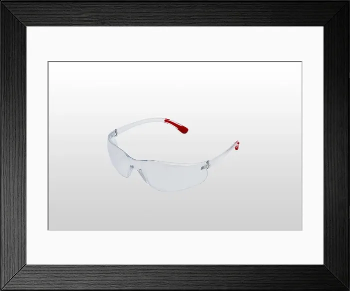Framed Print : Safety glasses are transparent. Close-up. Isolated on a gray background Framed Print : Safety glasses are transparent. Close-up. Isolated on a gray background