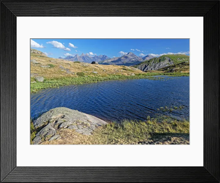 Framed Print : Shore of the Guichard Lake on Col de la Croix de Fer, with Aiguilles d'Arves in the background Framed Print : Shore of the Guichard Lake on Col de la Croix de Fer, with Aiguilles d'Arves in the background