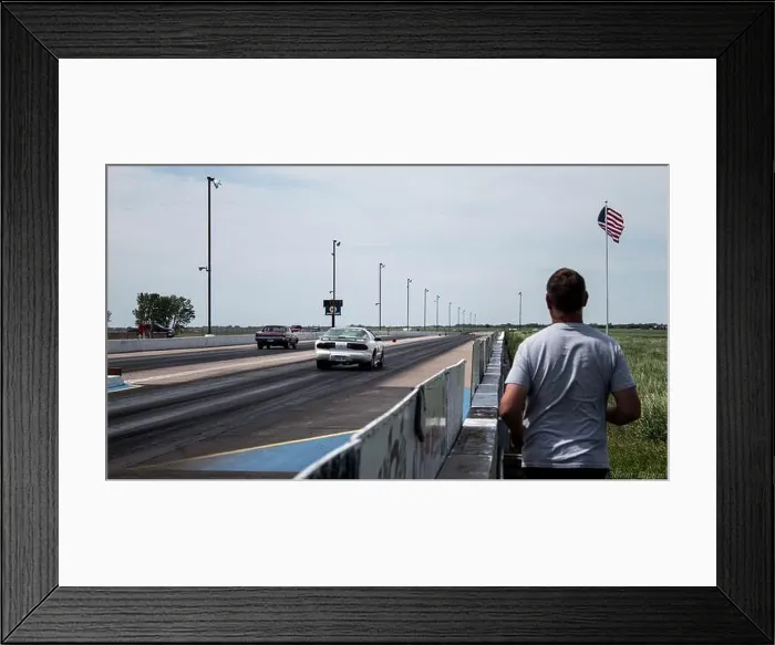 Framed Print : Morning at the drag race in Kearney, Nebraska with cars racing on the tracks and a man watching Framed Print : Morning at the drag race in Kearney, Nebraska with cars racing on the tracks and a man watching