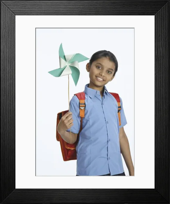Framed Print : Rural girl carrying school bag on shoulder holding whirligig in left hands MR#743C Framed Print : Rural girl carrying school bag on shoulder holding whirligig in left hands MR#743C