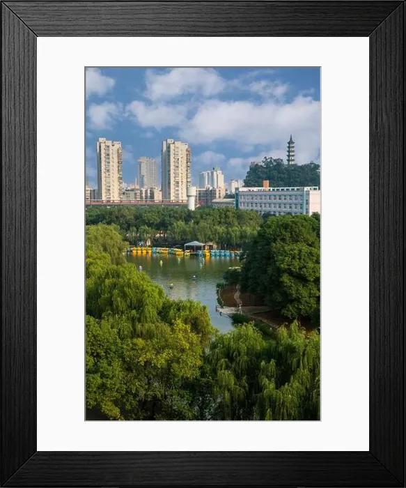 Framed Print : Wenzhou, Zhejiang, China. Apartment Buildings in Background, Recreational Boats on Lake in Foreground Framed Print : Wenzhou, Zhejiang, China. Apartment Buildings in Background, Recreational Boats on Lake in Foreground