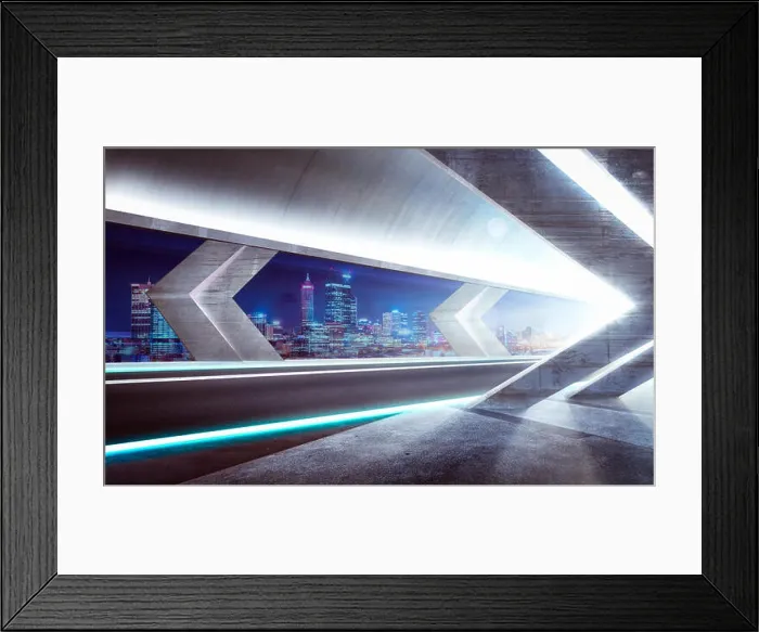 Framed Print : Modern asphalt road in glass tunnel with beautiful city skyline background. Night scene Framed Print : Modern asphalt road in glass tunnel with beautiful city skyline background. Night scene