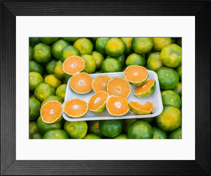 Framed Print : Freshly picked green tangerines mandarines, clementines, as Citrus fruit background Framed Print : Freshly picked green tangerines mandarines, clementines, as Citrus fruit background