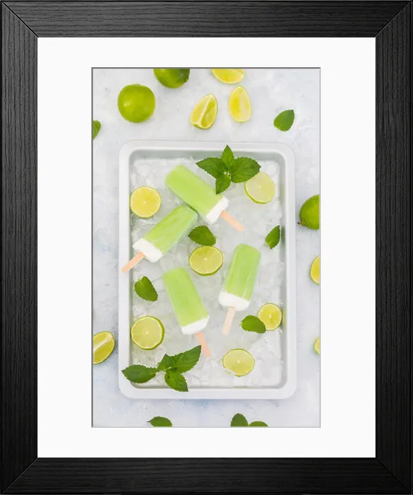 Framed Print : Lime mint popsicles, slices of limes and mint leaves on crushed ice Framed Print : Lime mint popsicles, slices of limes and mint leaves on crushed ice