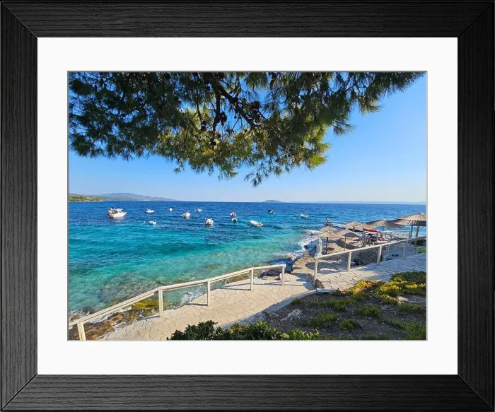 Framed Print : Scenic coastal view with boats docked in crystal clear turquoise waters in Salonic, Greece Framed Print : Scenic coastal view with boats docked in crystal clear turquoise waters in Salonic, Greece