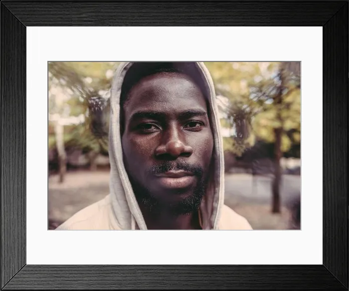 Framed Print : USA, Pennsylvania, Philadelphia, Portrait of man in hooded shirt Framed Print : USA, Pennsylvania, Philadelphia, Portrait of man in hooded shirt