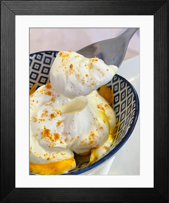 Framed Print : Eating creamy dessert. Close view Framed Print : Eating creamy dessert. Close view