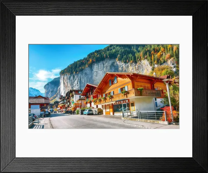 Framed Print : Fantastic autumn view of traditional swiss houses in Lauterbrunnen village Framed Print : Fantastic autumn view of traditional swiss houses in Lauterbrunnen village