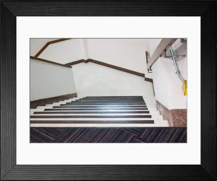 Framed Print : Empty office staircase vanishing downstairs Framed Print : Empty office staircase vanishing downstairs