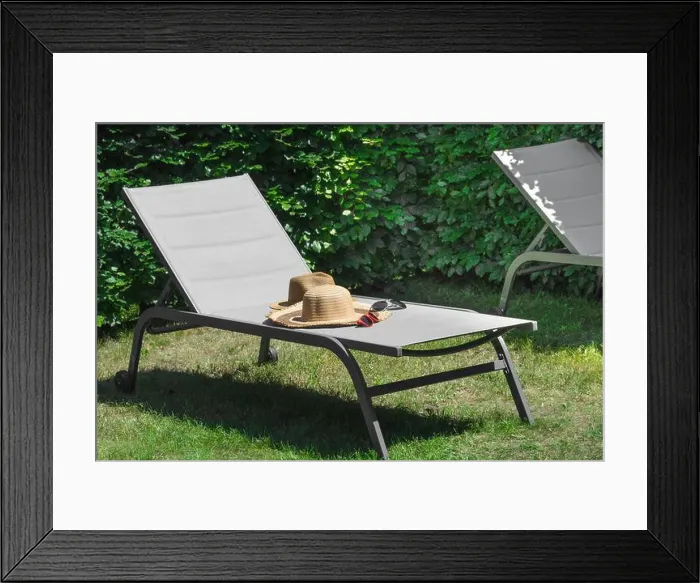 Framed Print : Two beach hats and sunglasses of a man and a woman left on a beach lounger. Summer still life Framed Print : Two beach hats and sunglasses of a man and a woman left on a beach lounger. Summer still life