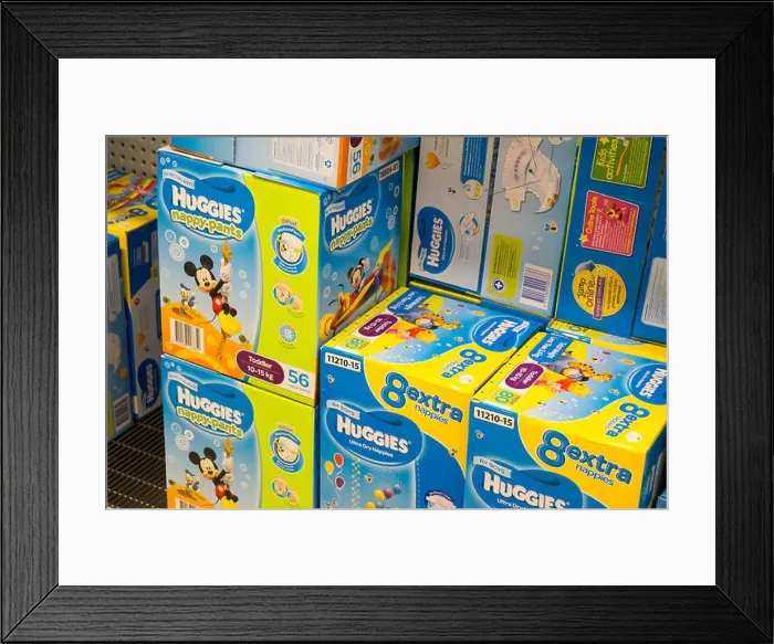 Framed Print : Huggies nappies on sale in an australian woolworths supermarket store supermarket, Sydney Framed Print : Huggies nappies on sale in an australian woolworths supermarket store supermarket, Sydney