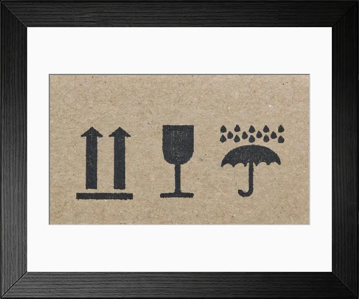 Framed Print : Warning labels on cardboard box silhouette shapes umbrella glass arrows Framed Print : Warning labels on cardboard box silhouette shapes umbrella glass arrows