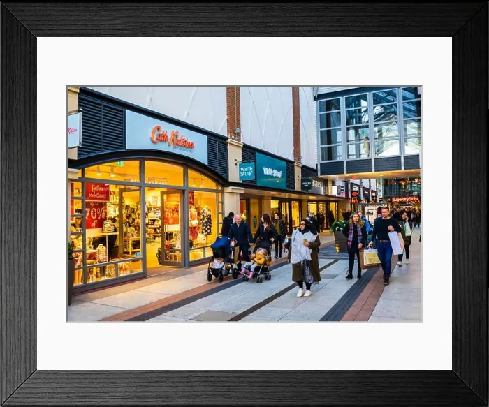 Framed Print : Shop fronts in the busy shopping mall in Gunwharf Quays shopping centre, Portsmouth, Hampshire, south coast England Framed Print : Shop fronts in the busy shopping mall in Gunwharf Quays shopping centre, Portsmouth, Hampshire, south coast England