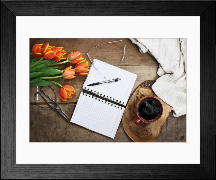 Framed Print : Overhead shot a bouquet of an open book or garden planner Framed Print : Overhead shot a bouquet of an open book or garden planner