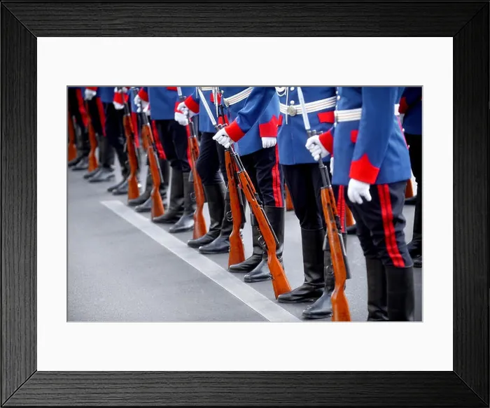 Framed Print : Detail with the hand of a soldier on a bayonet rifle in rest position during a military parade