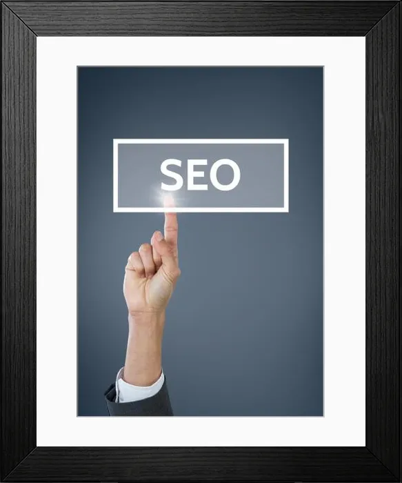 Framed Print : Digital composite of Hand interacting with SEO business text against blue background Framed Print : Digital composite of Hand interacting with SEO business text against blue background