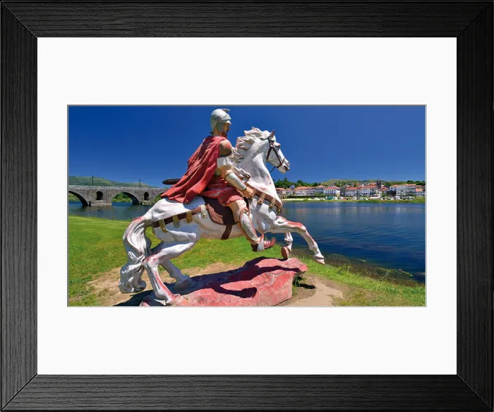 Framed Print : Portugal, MInho: Statue of a roman soldier on horse calling his troops on the other side of river Lima in Ponte de Lima Framed Print : Portugal, MInho: Statue of a roman soldier on horse calling his troops on the other side of river Lima in Ponte de Lima