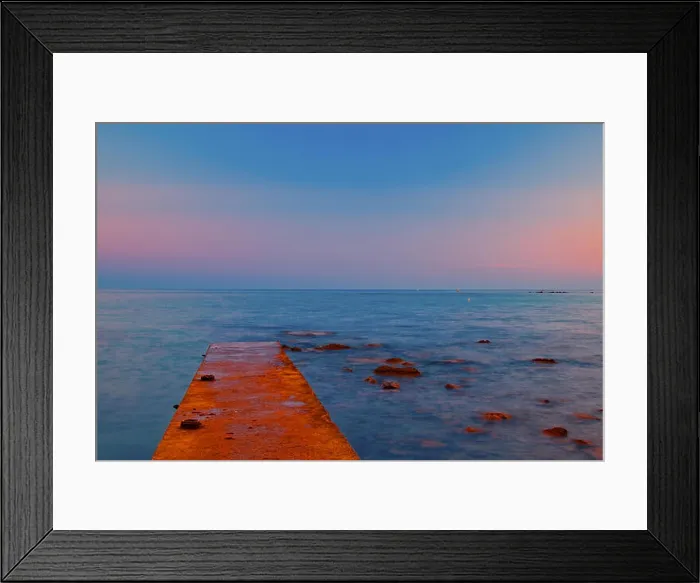 Framed Print : Stormy weather on sunset on the rocky shore Framed Print : Stormy weather on sunset on the rocky shore