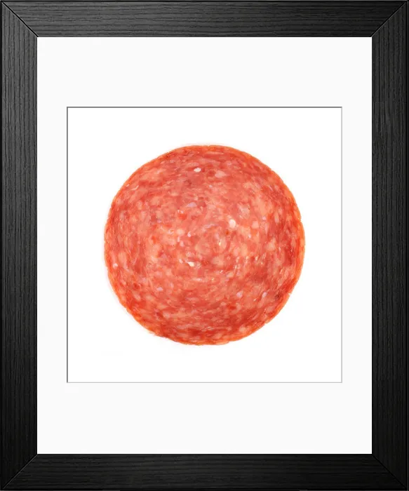 Framed Print : Single slice of hard salami Framed Print : Single slice of hard salami
