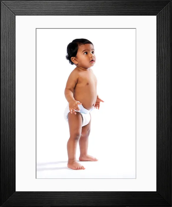 Framed Print : Cute baby toddler standing and looking amazed surprised up wearing diaper, childhood concept Framed Print : Cute baby toddler standing and looking amazed surprised up wearing diaper, childhood concept