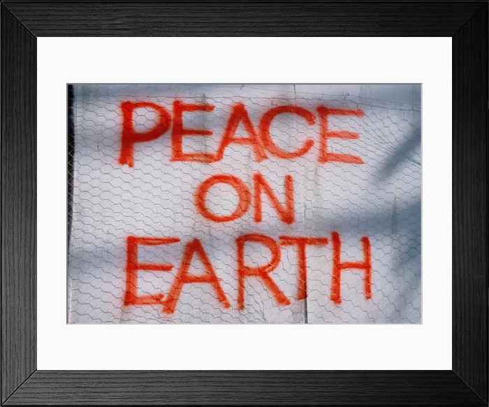 Framed Print : Artwork. Graffiti message painted on wall. 'Peace on Earth' Framed Print : Artwork. Graffiti message painted on wall. 'Peace on Earth'